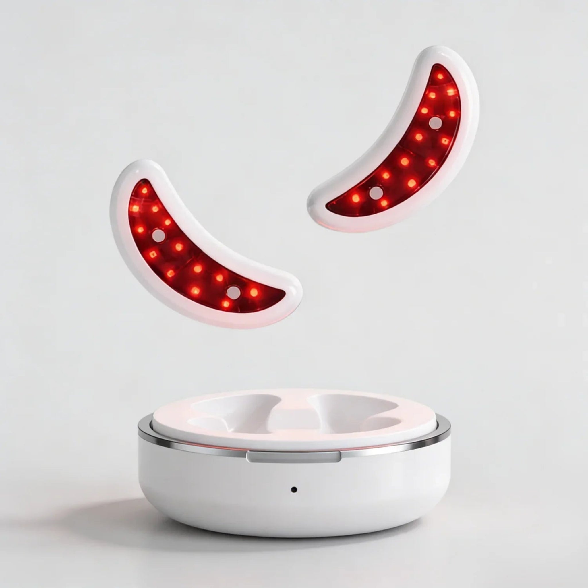 White electronic device with red LED lights on a light gray background