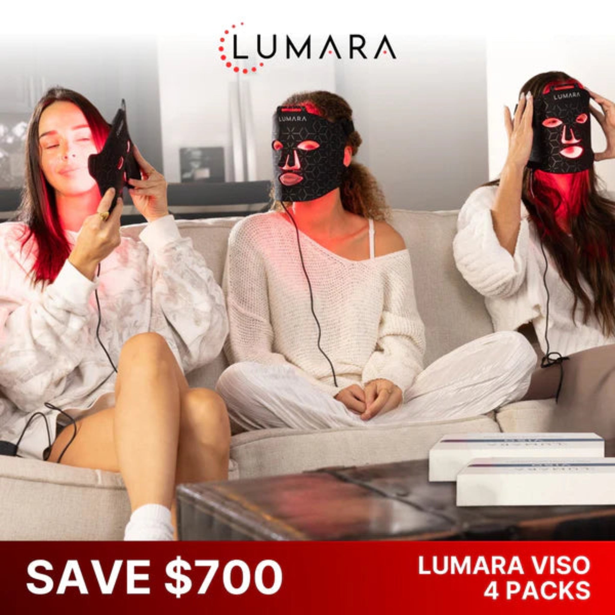 Three women sitting on a couch using Lumara LED face masks with promotional text at the bottom.
