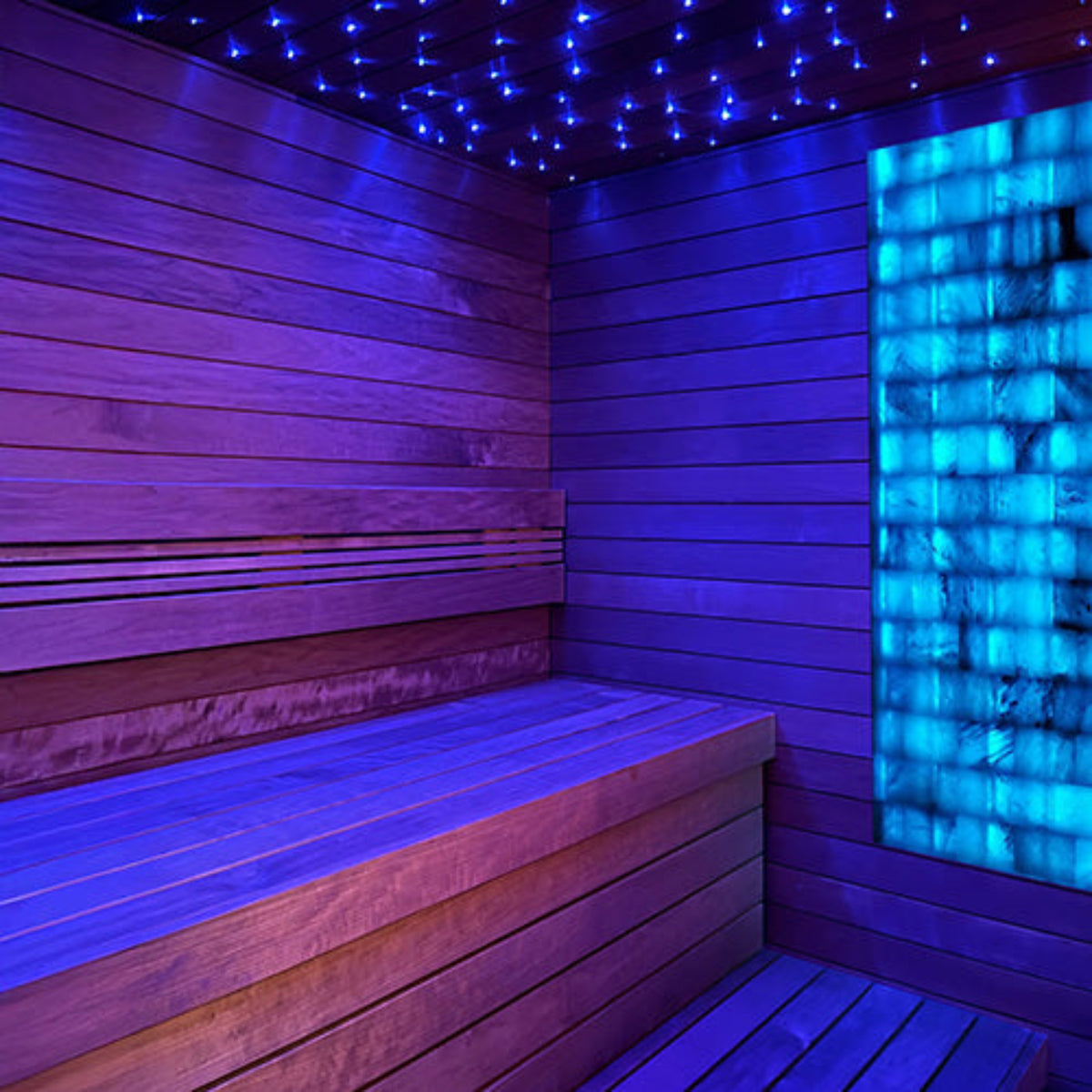 PROSAUNAS blue Himalayan Salt Wall in a sauna with bench