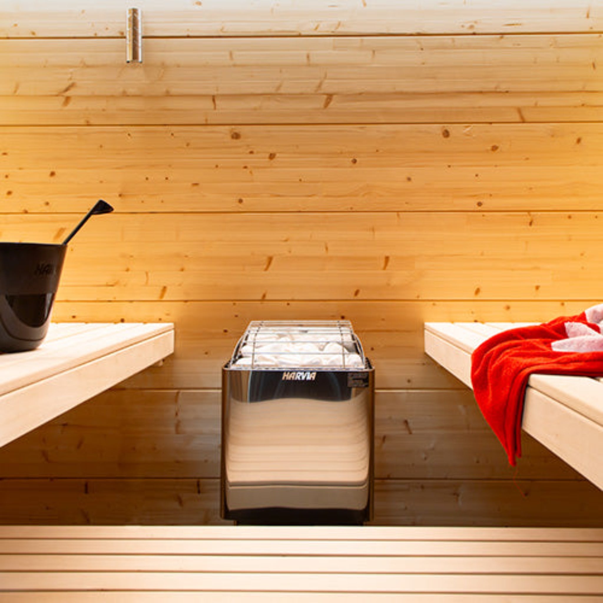 Harvia KIP45B sauna heater — front view showing stone basket and built-in controls