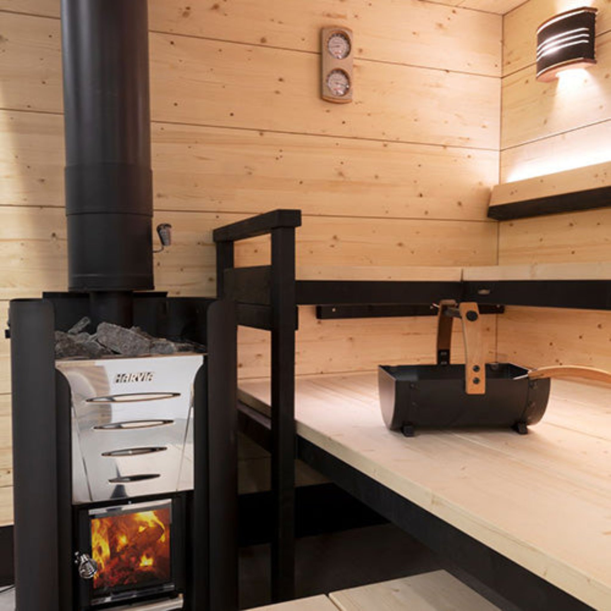 Harvia Legend Sauna Bucket SASPO100 in sauna setting