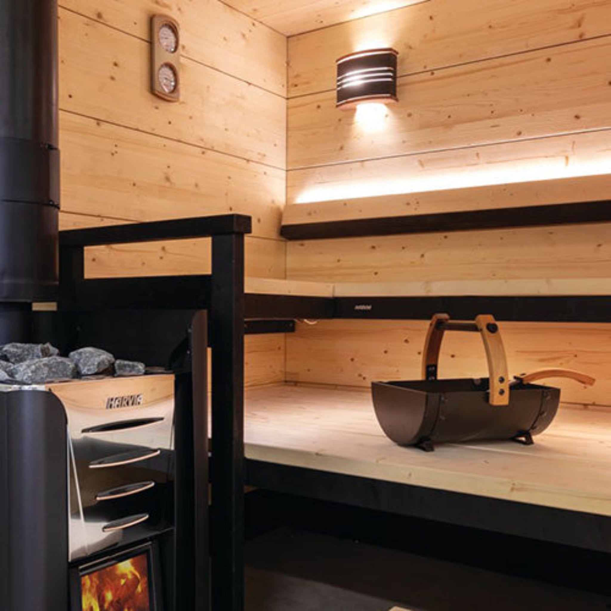 Harvia Legend Sauna Ladle SASPO101 in sauna setting