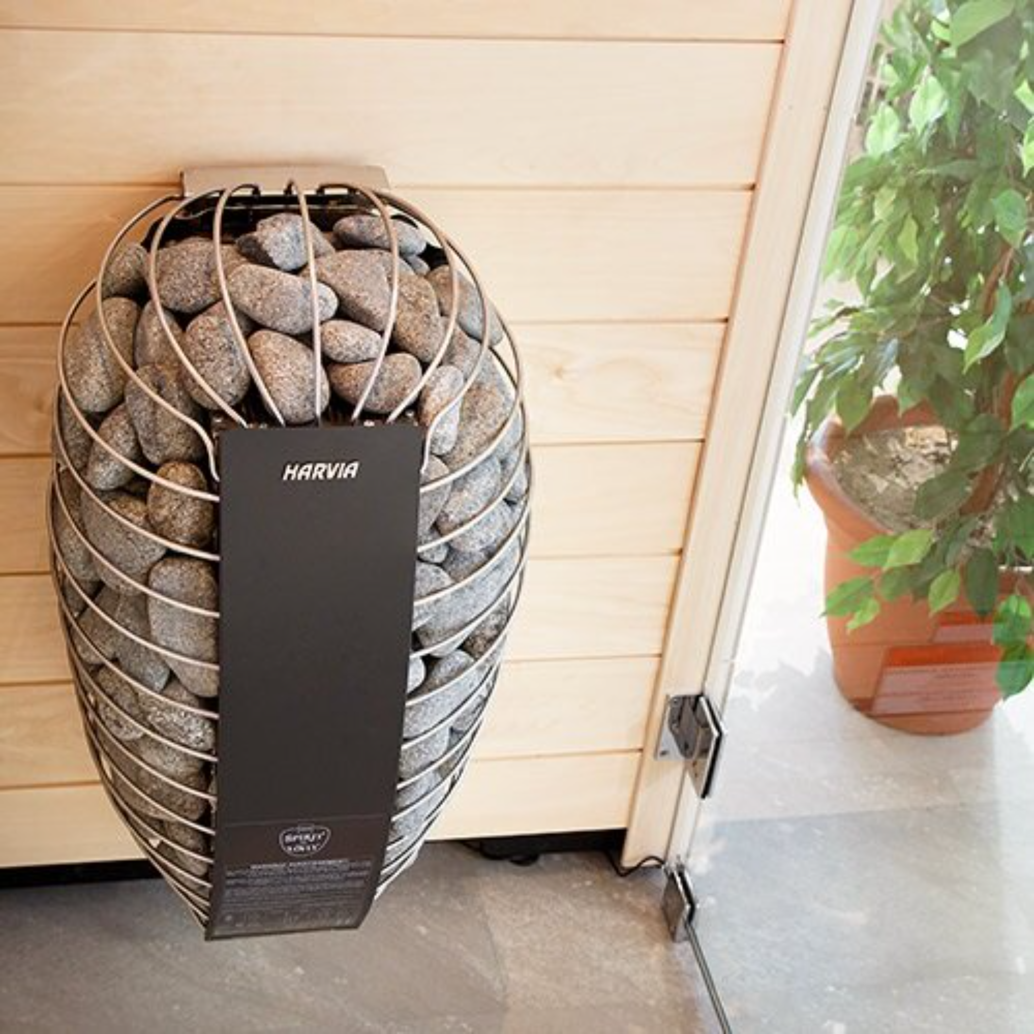 Harvia Spirit 9kW black electric sauna heater installed in a modern sauna room