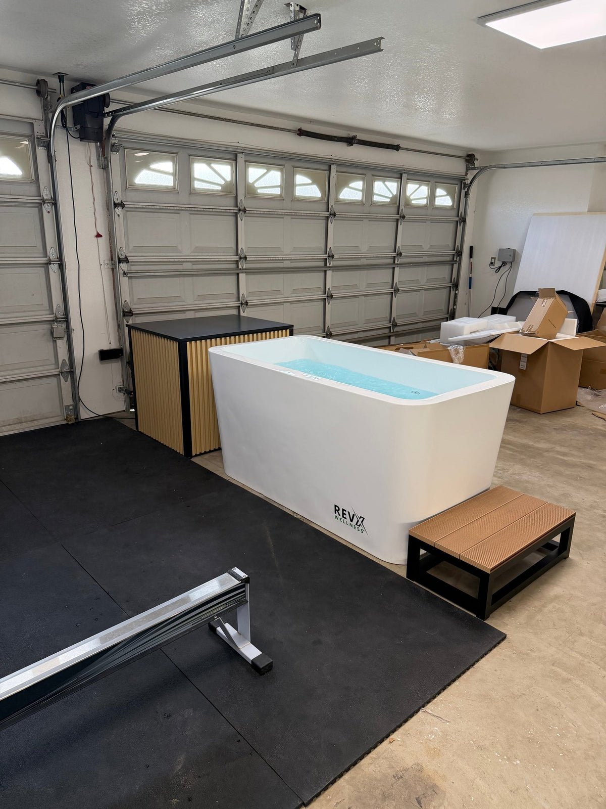 RevX Acrylic X Tub and LUX cabinet installed in a garage
