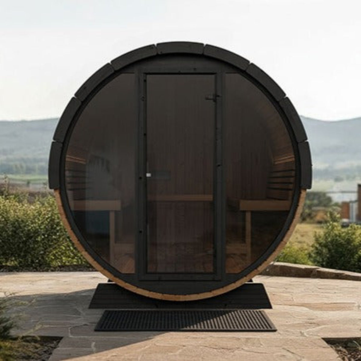 SaunaLife Ergo Elegance-Series Model EE8G Outdoor Barrel Sauna, set against a scenic landscape.