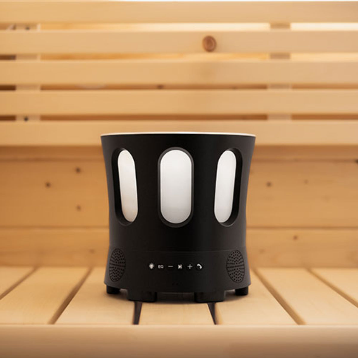 SaunaLife Zone Bluetooth Sauna Bucket with three circular openings on a wooden surface