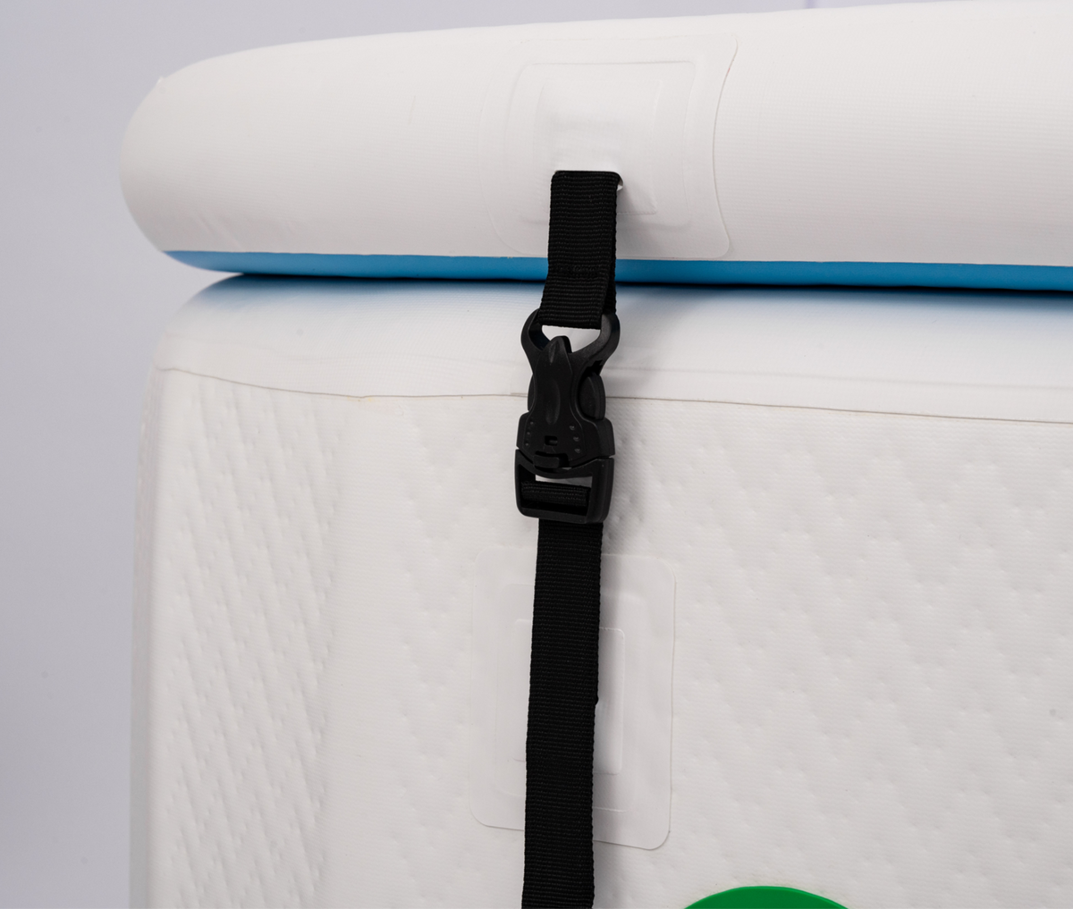 Close-up of a RevX inflatable tub lid buckle