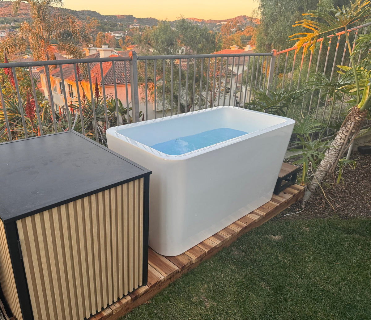 RevX Acrylic X Tub and LUX cabinet on a backyard deck