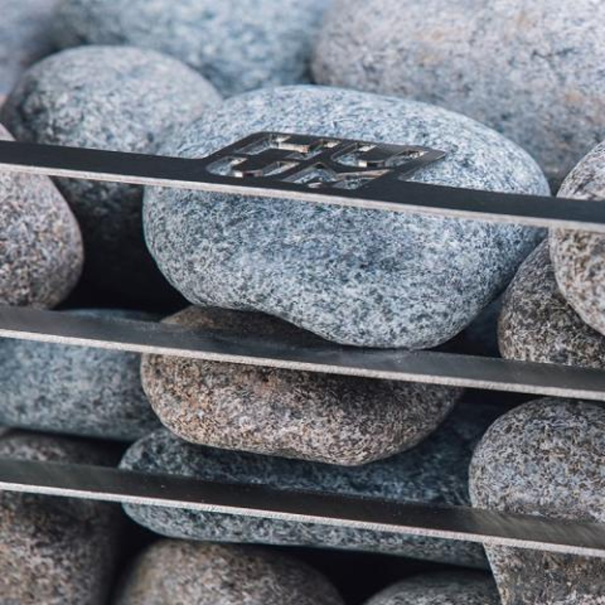HUUM CLIFF sauna heater — stone basket and heating element detail