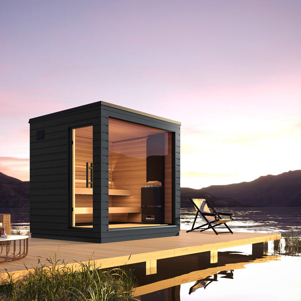 SaunaLife outdoor sauna cabin in a lush backyard garden setting