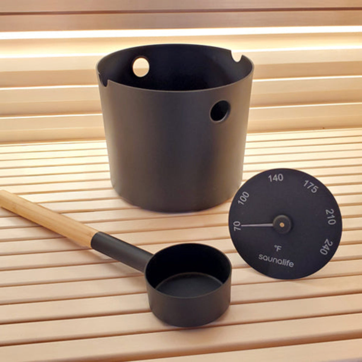 SaunaLife Essentials Set 6 Aluminum Sauna Bucket and Ladle Set w/ Thermometer black on wooden sauna bench