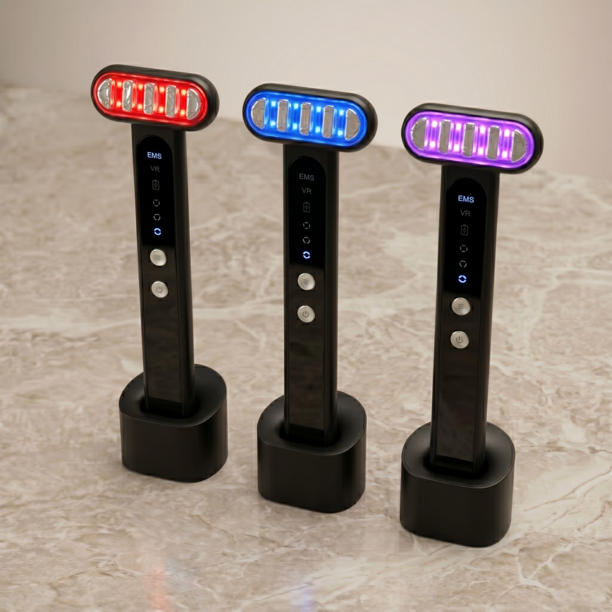 TheraSculpt™ Facial Sculpting & Red Light Therapy Device in three colors on marble countertop.