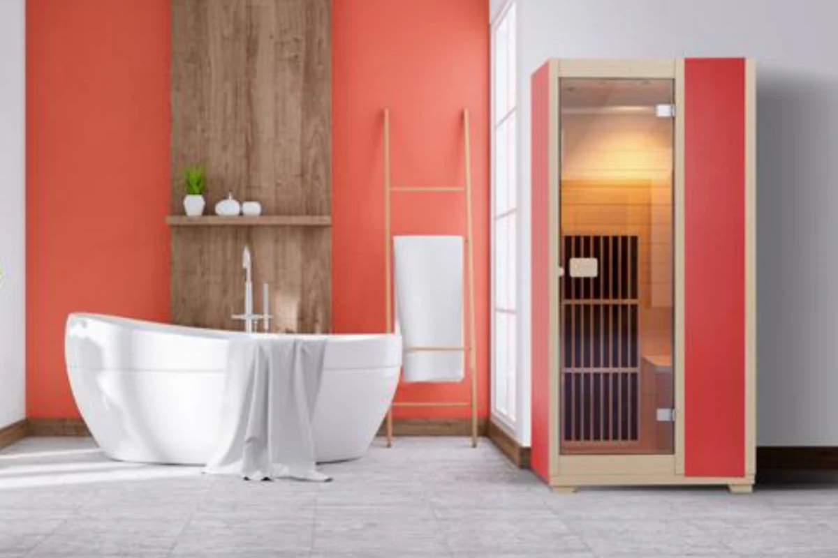 Far Infrared Sauna in modern bathroom setting with stylish tub and natural elements.
