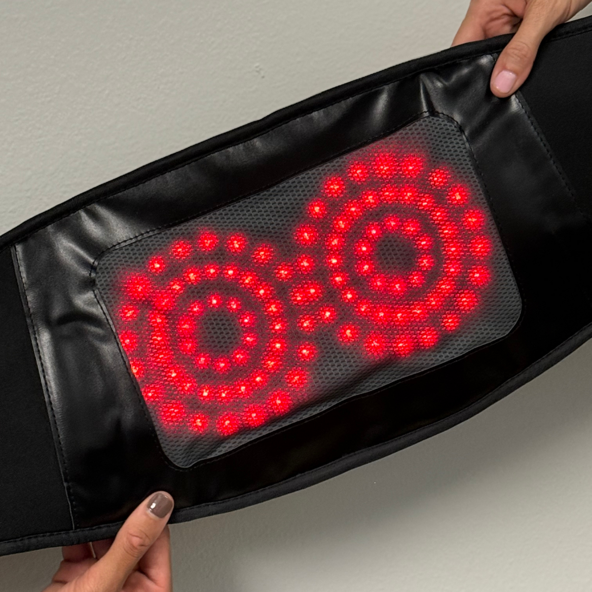 TheraBelt Red Light Therapy Belt showing red LED lights.