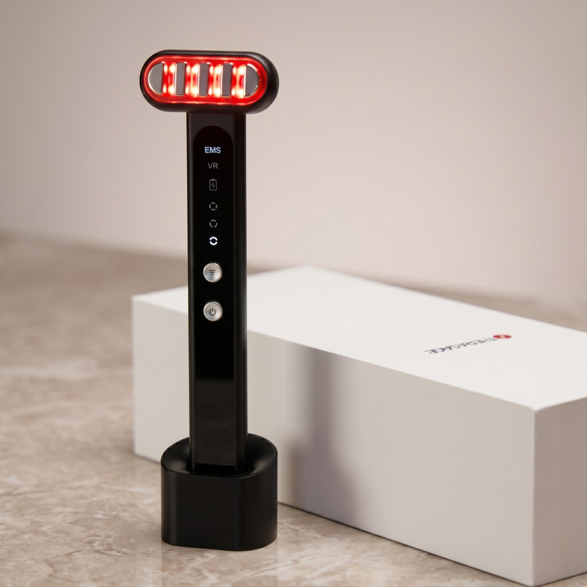 TheraSculpt™ Facial Sculpting & Red Light Therapy Device on a marble surface with packaging.