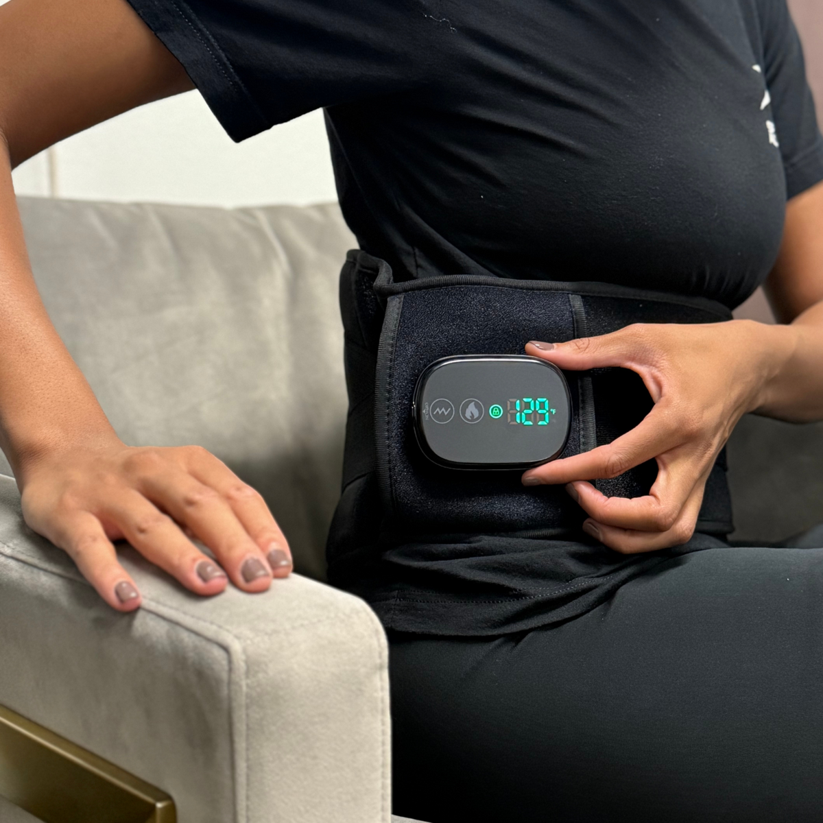 TheraBelt Red Light Therapy Belt displayed on a user, showcasing its adjustable design and digital control.