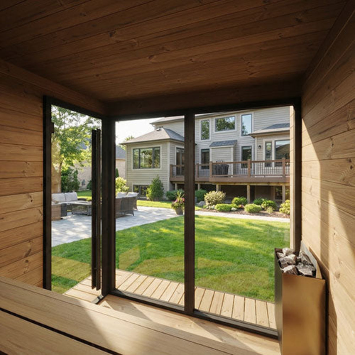 SaunaLife Garden Luxury-Series GL6B inside view looking out the front glass. in a backyard setting