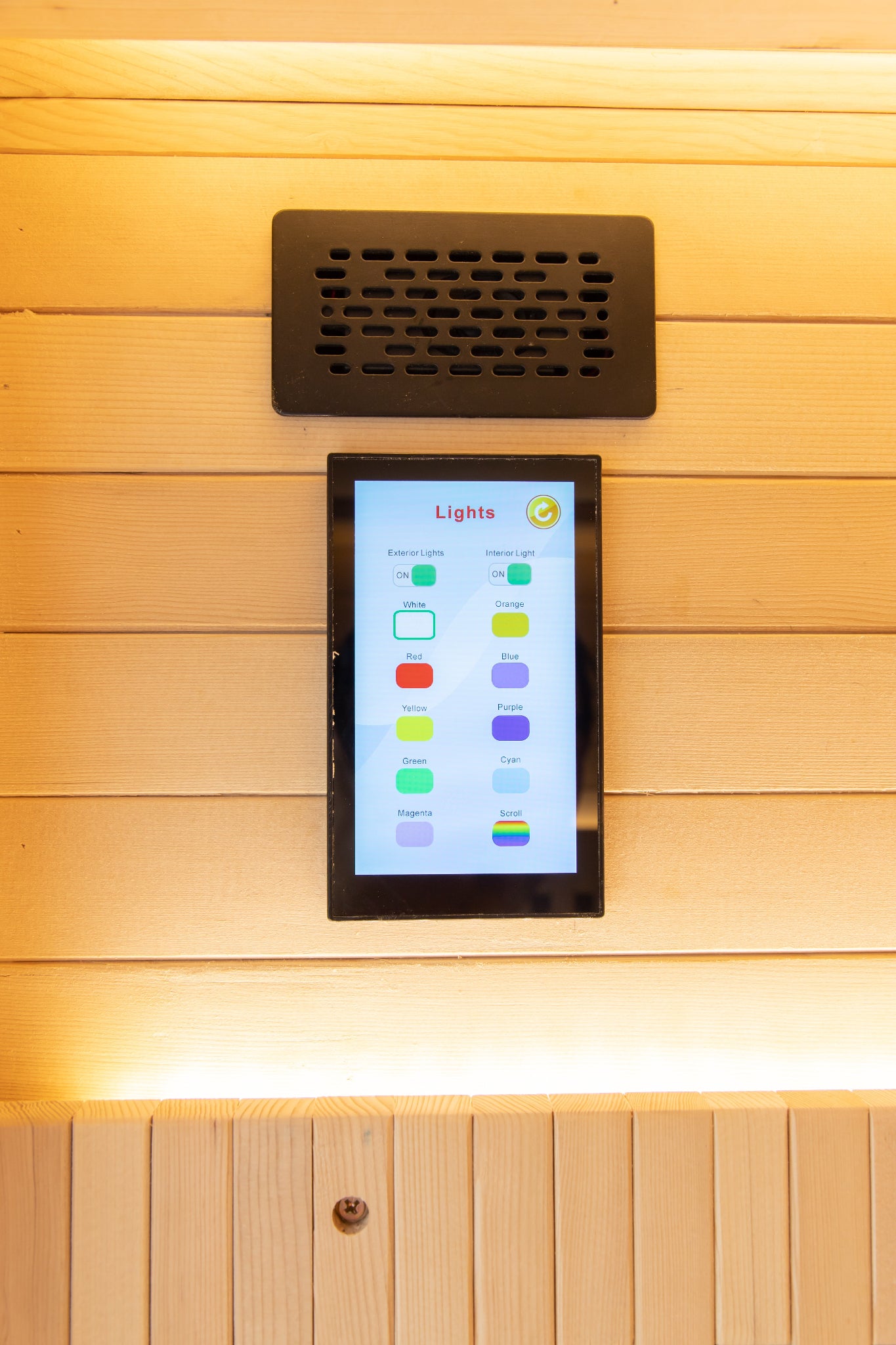 Digital display on a wooden wall with control options inside the Nicebeam Canadian Hemlock sauna