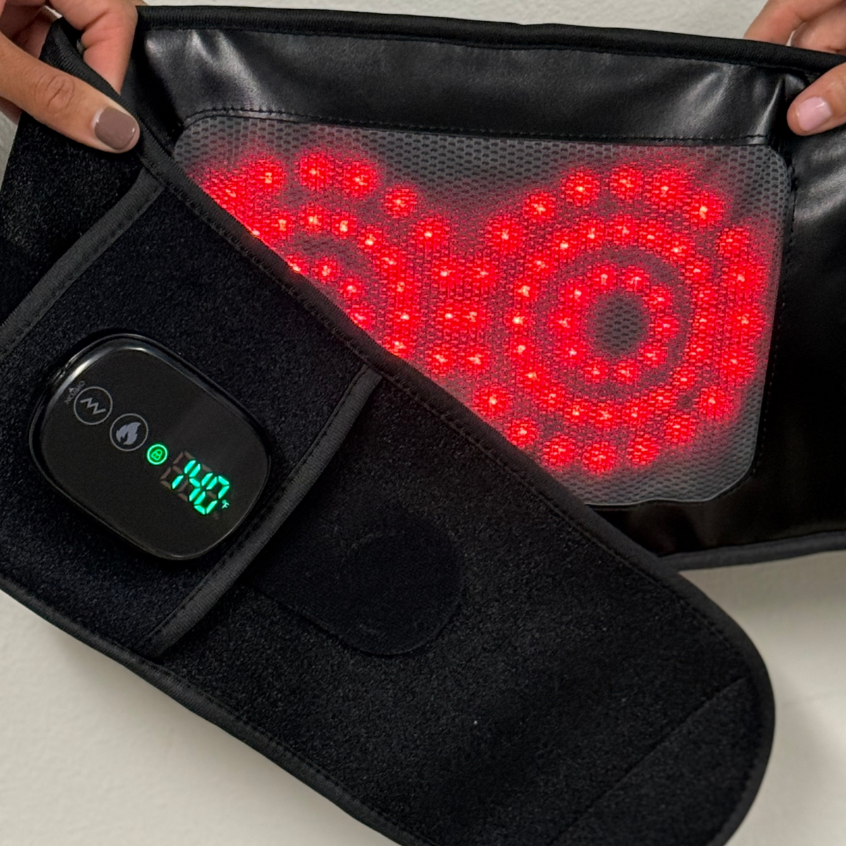 TheraBelt Red Light Therapy Belt showcasing red lights and adjustable control.