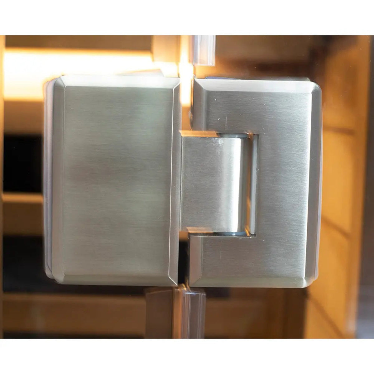 Stainless steel hinge detail of a 1-person infrared sauna red cedar by Wizzisaunas.