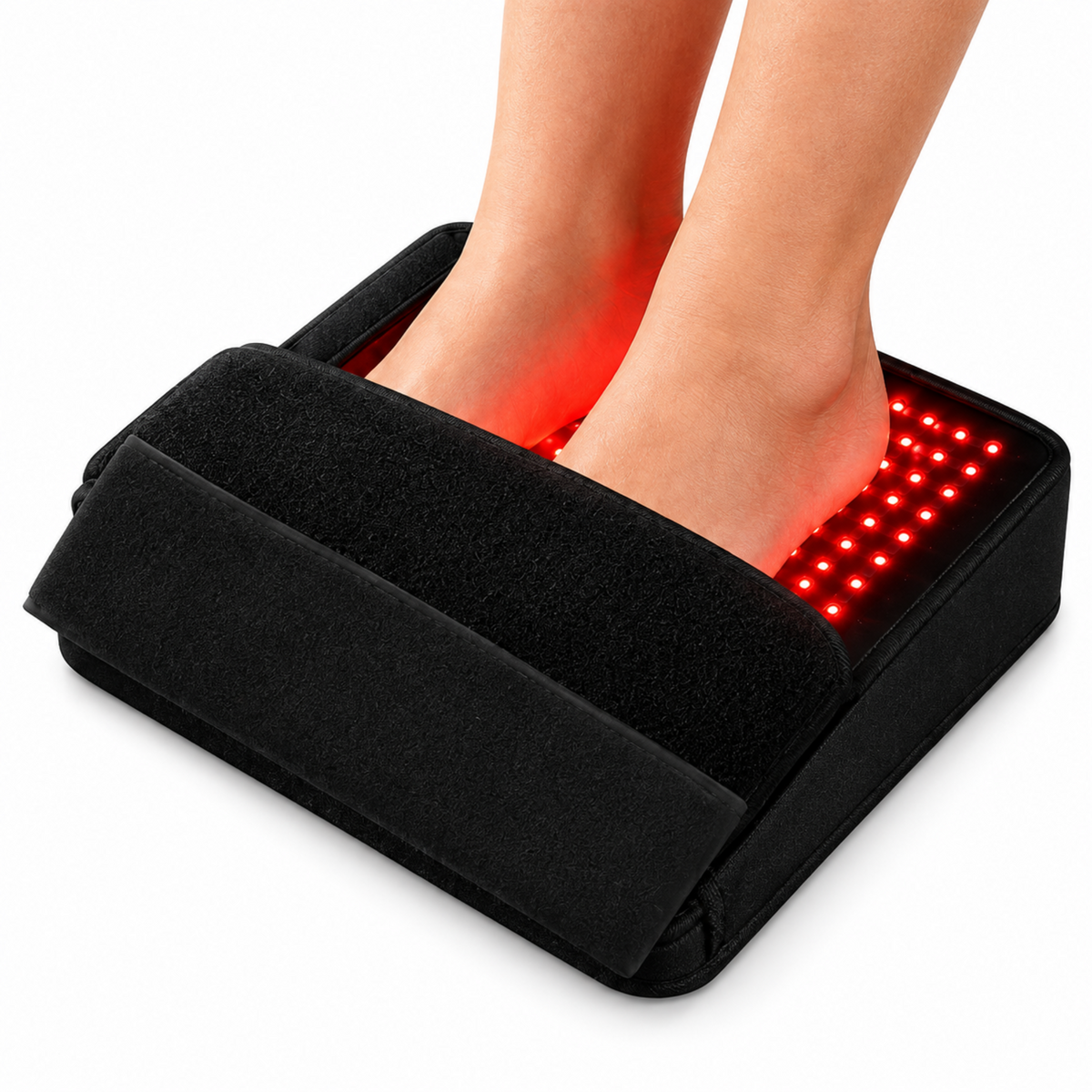 A person's feet resting on a black Red Light Pro foot pad with glowing red LED lights, shown against a plain white background.