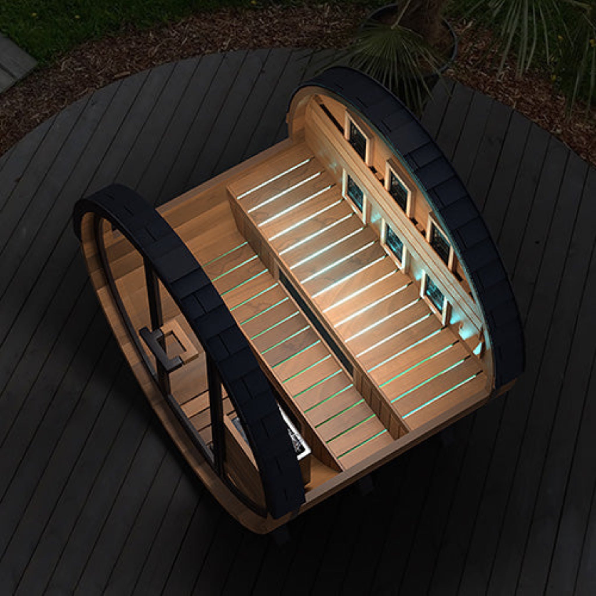 Finnmark FD-6 combination barrel sauna outdoor night view with LED lighting and open door