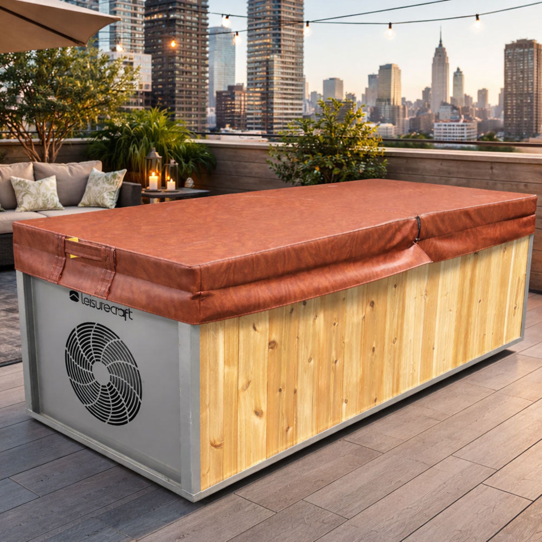 Dundalk LeisureCraft Flow Cold Plunge | Cedar & Stainless Steel in a stylish outdoor setting with a city view.