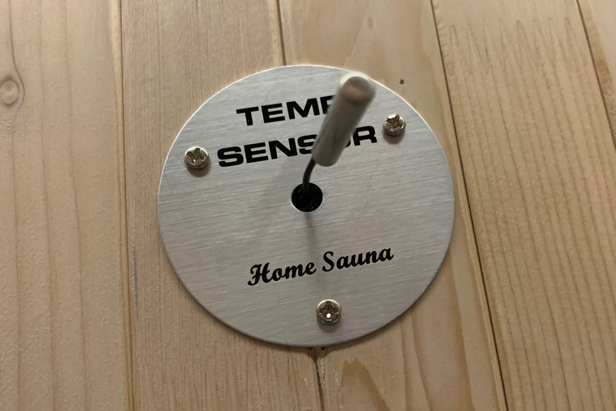 Temperature sensor installed in a Full Spectrum Indoor Sauna for monitoring heat levels.