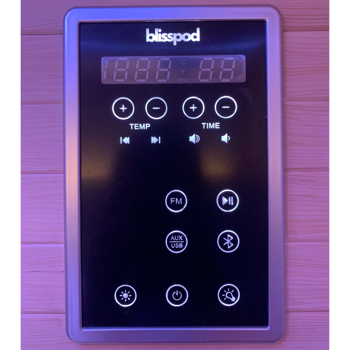 Control panel of a Full Spectrum Indoor Sauna featuring digital temperature and timer settings by Blisspod.