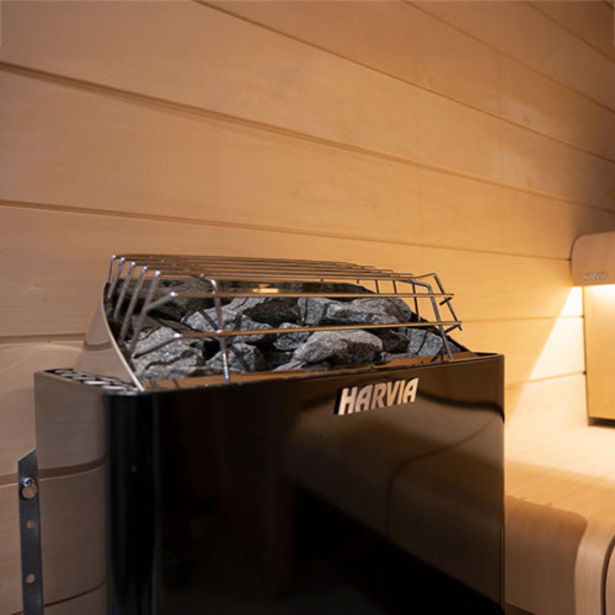 Harvia KIP80B sauna heater — lifestyle view installed in residential sauna room