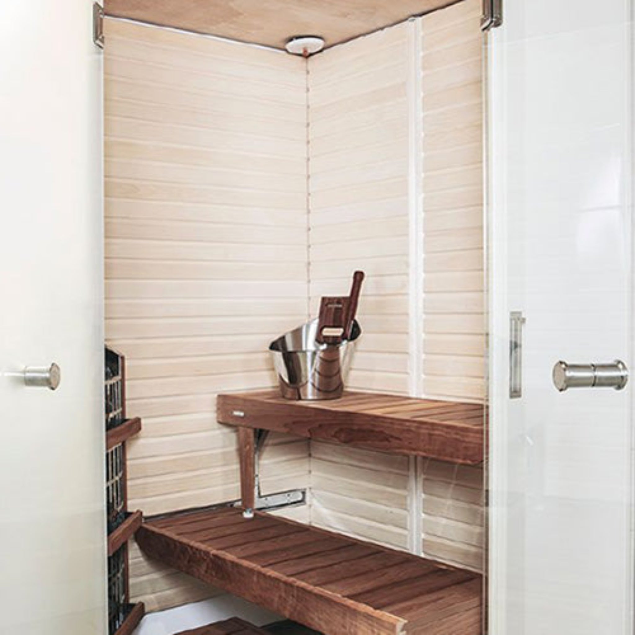Harvia steel sauna bucket and ladle with wood handles — lifestyle view