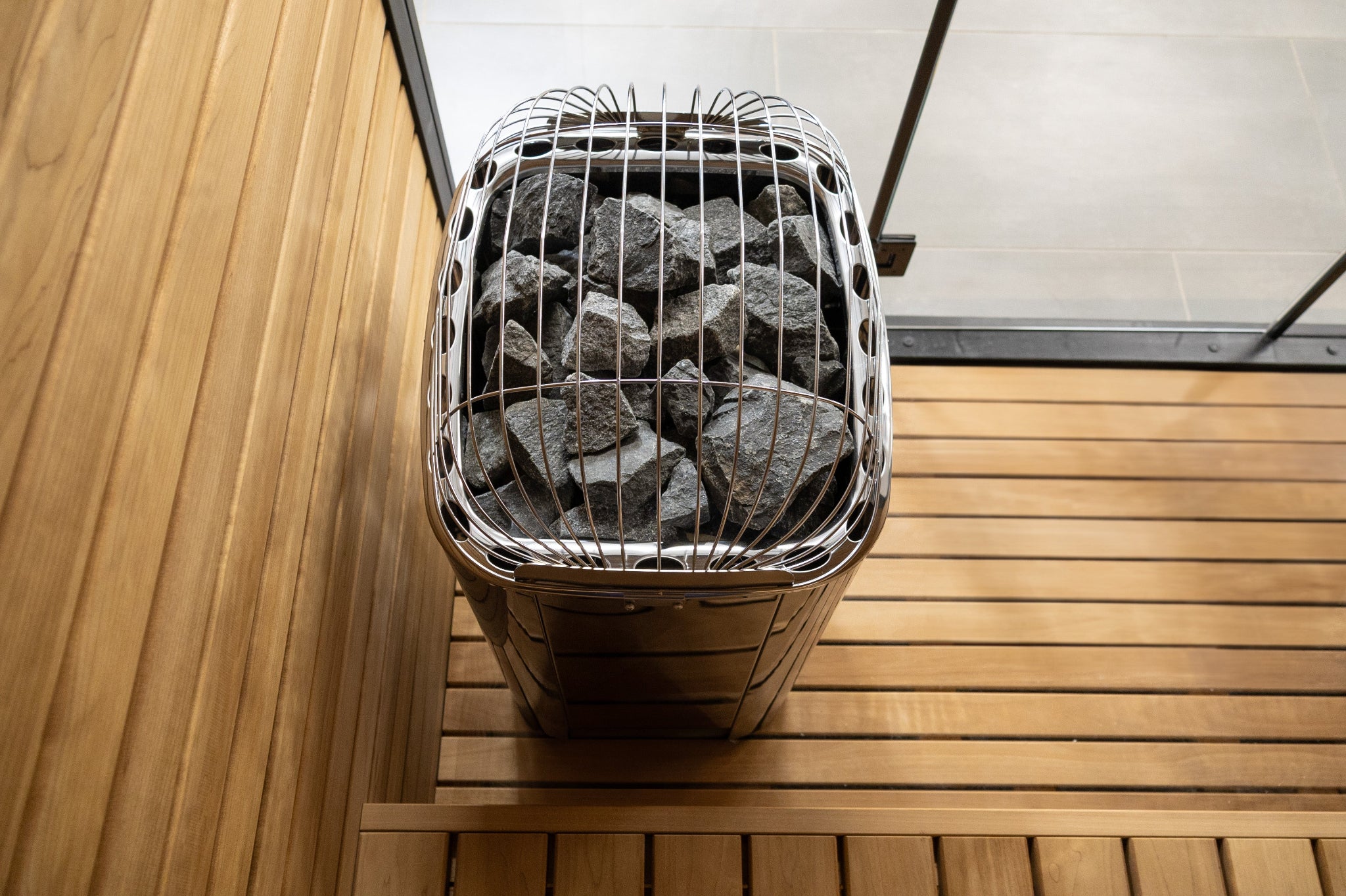 Harvia Club K10G sauna heater — top angle view showing stone capacity and stainless housing