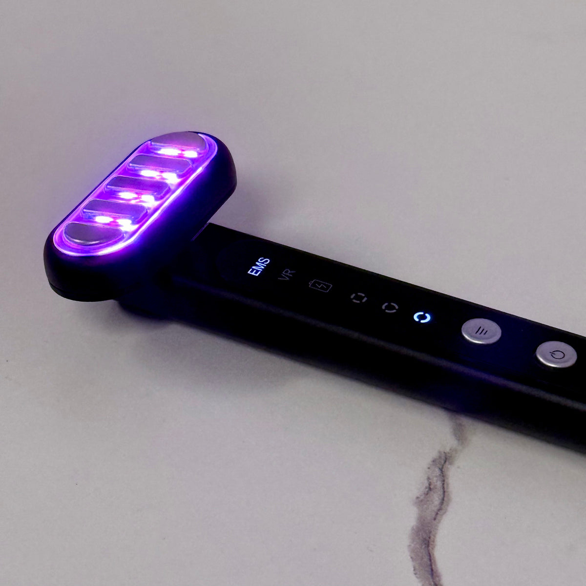TheraSculpt™ Facial Sculpting & Red Light Therapy Device with multiple LED lights for skincare.