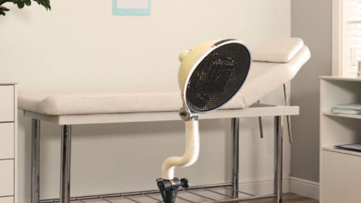 Sky Eye Pro Lamp shown alongside a treatment table
