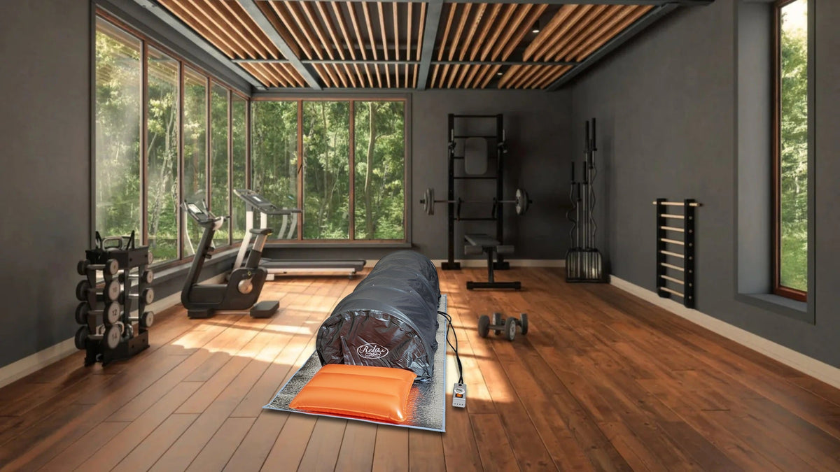 Infrared sauna set up in a modern gym with workout equipment and natural light.