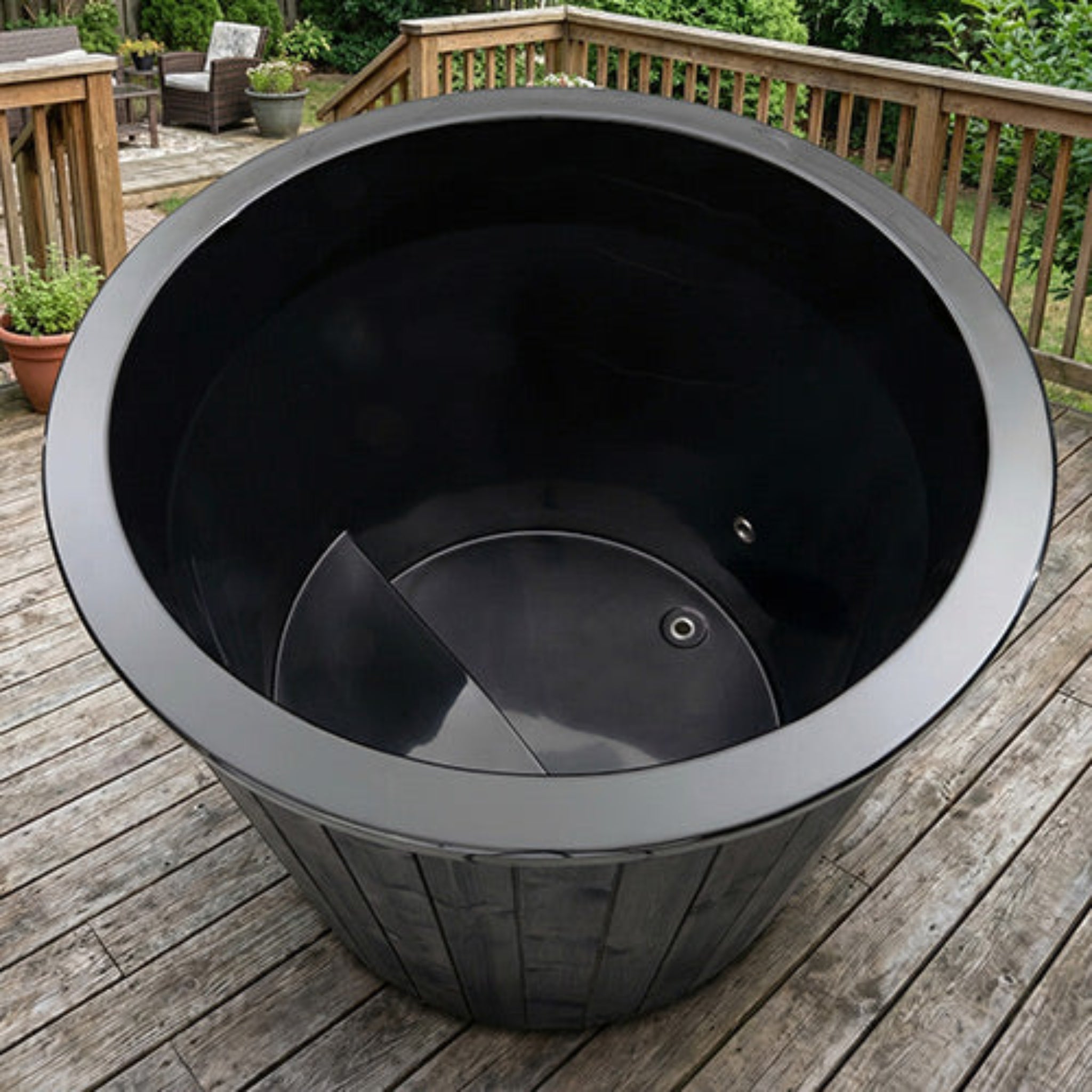 Saunalife immersion tub with inside view looking down on a deck