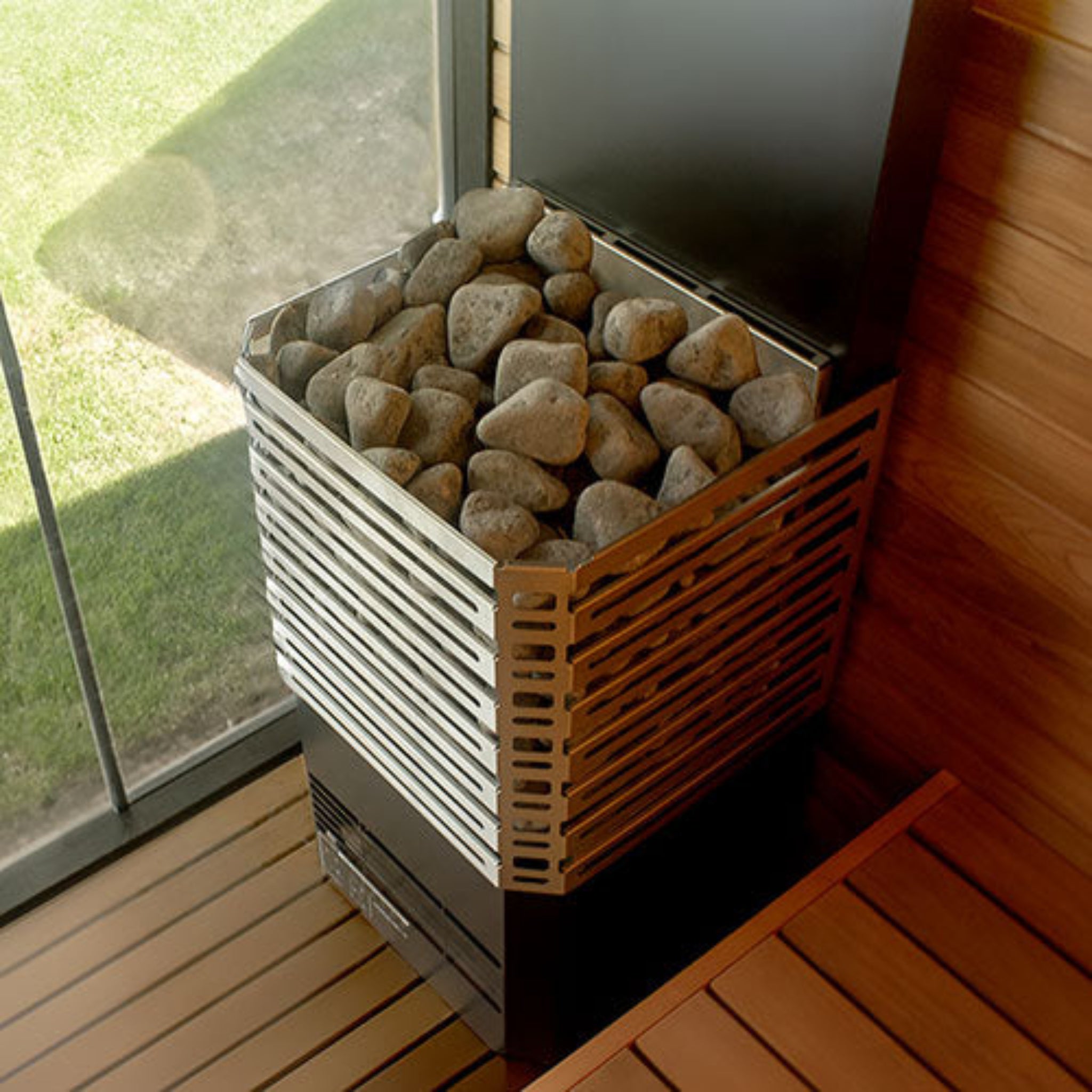 top stone view of Saunum Air Sauna Heater inside a sauna room