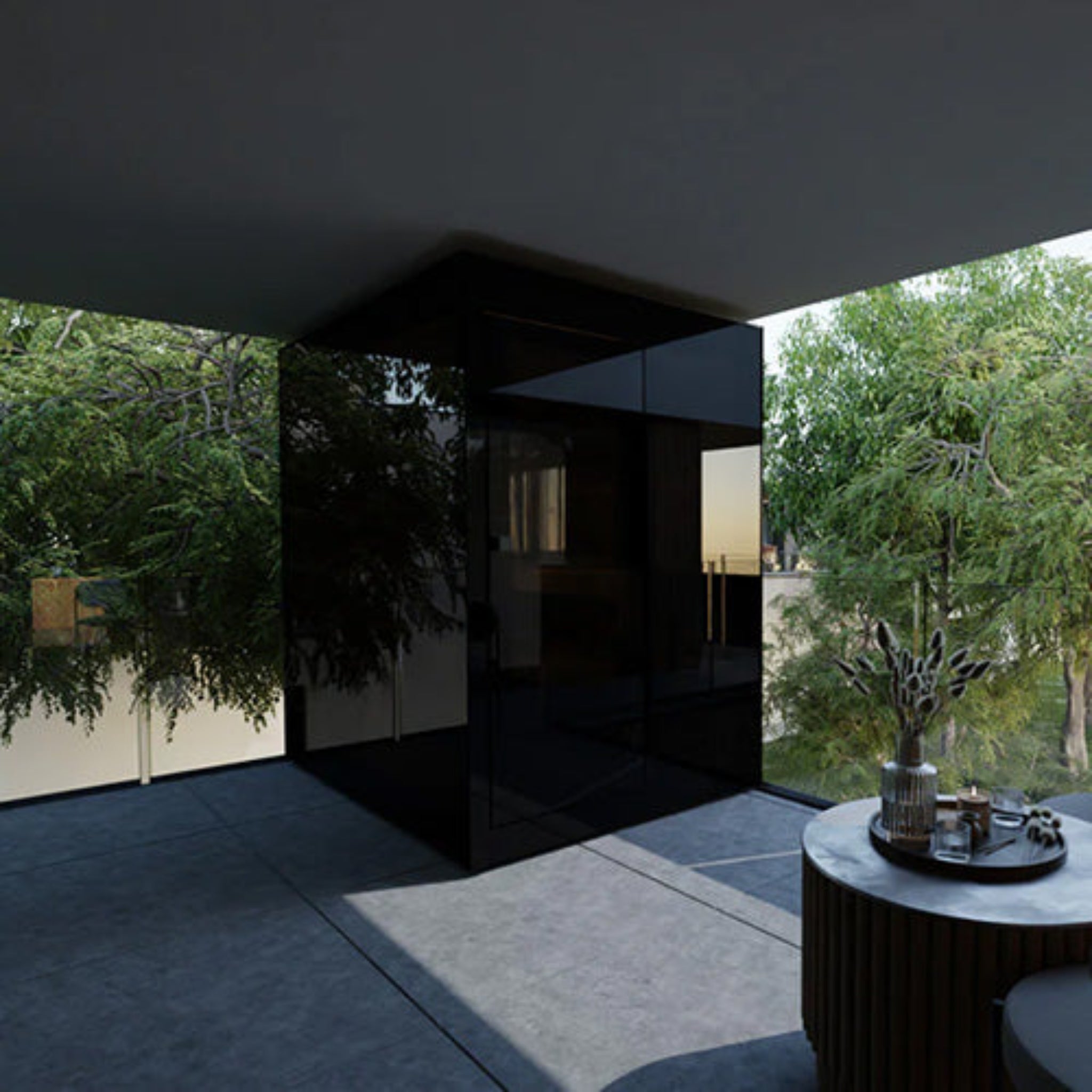 ThermaSol Vera sauna with a black glossy wall and large windows showing greenery outside.
