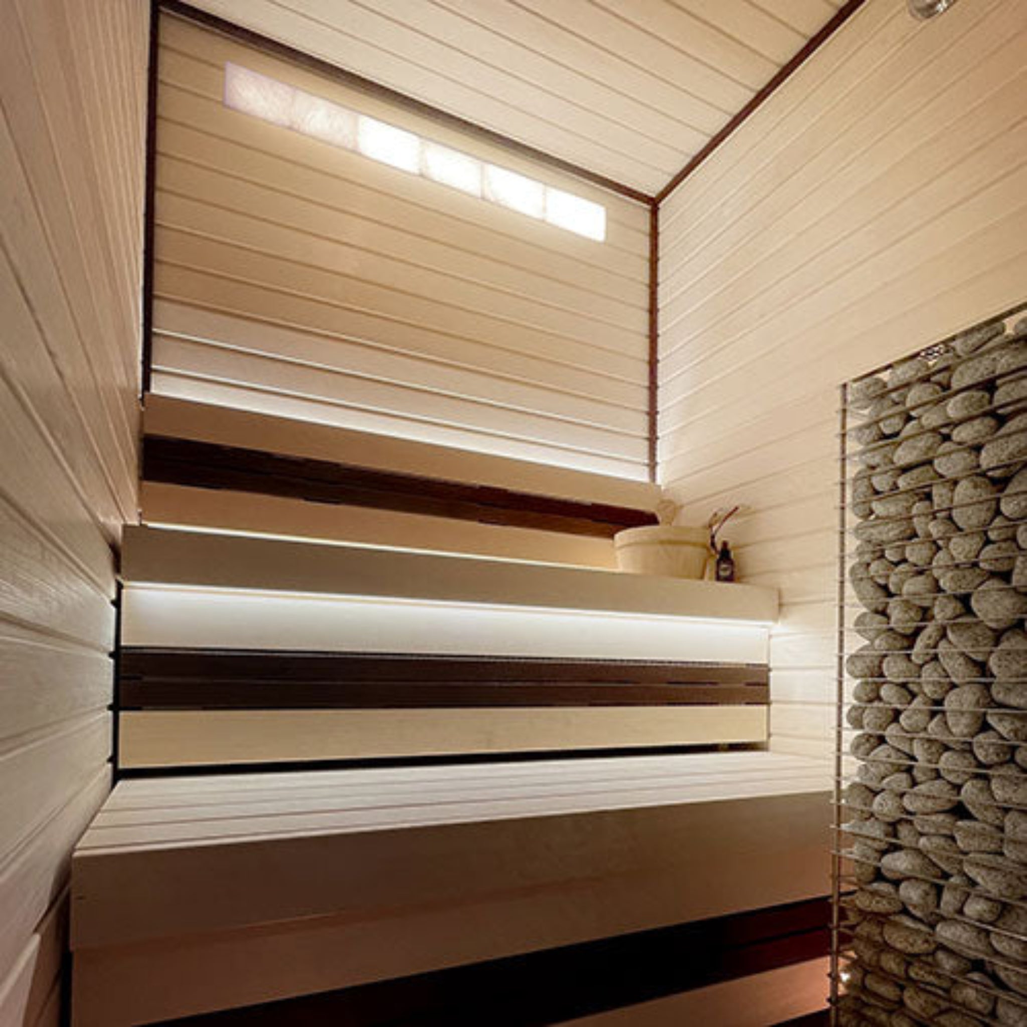 Wooden sauna with universal Himalayan salt light row, and a heater with stones and bench