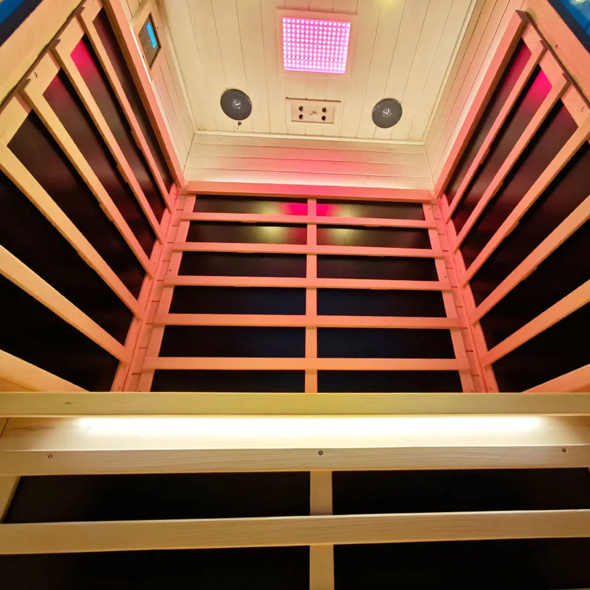 Interior view of the 2-person infrared sauna hemlock with lights and speakers designed for relaxation.