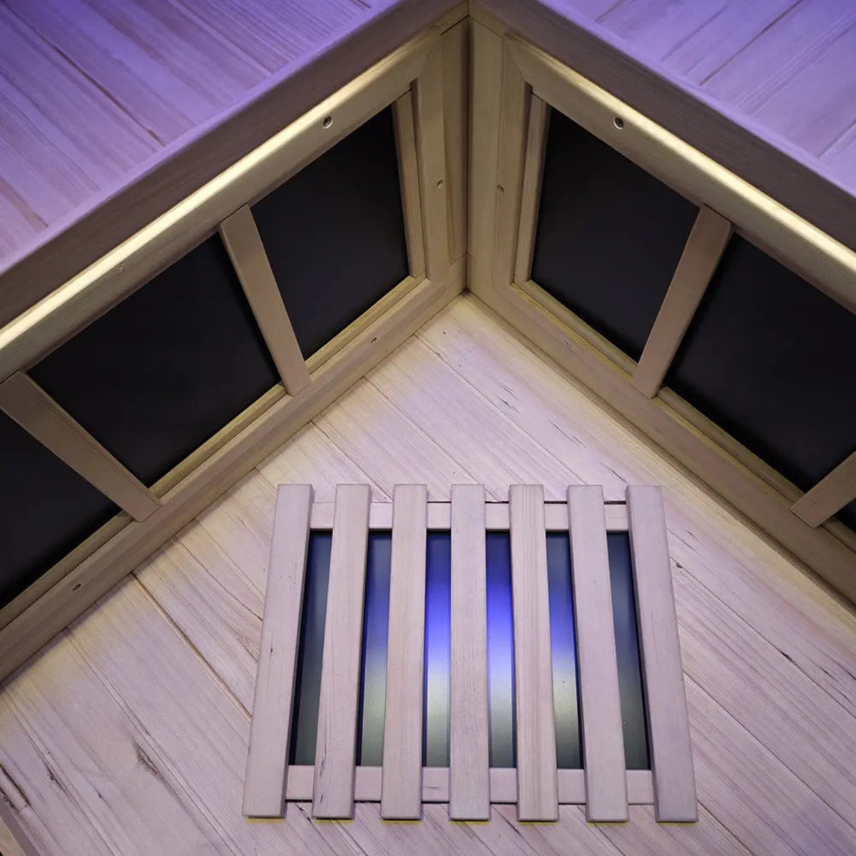 Interior view of a corner infrared sauna for 2-3 people, showcasing the wooden structure and heating panels.