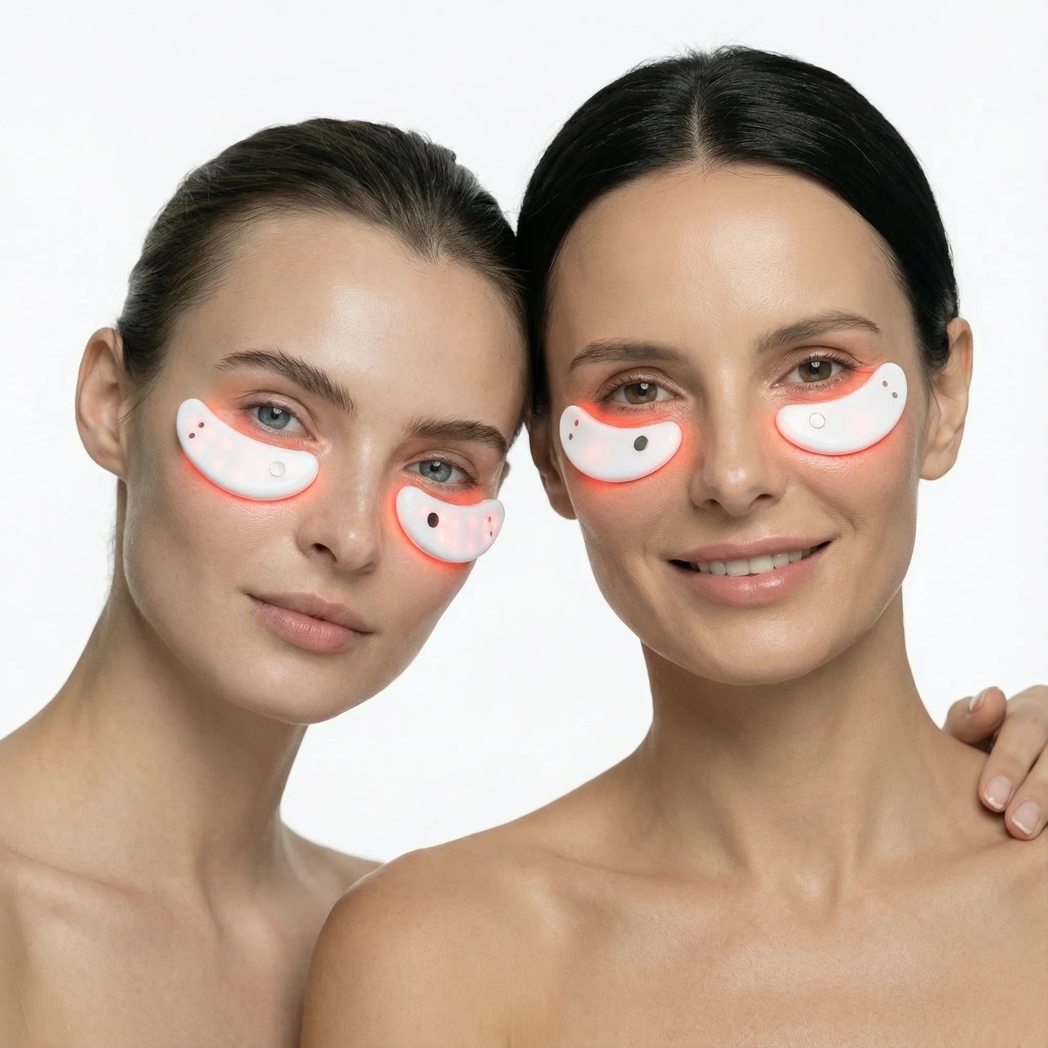 Two women with eye masks on a white background