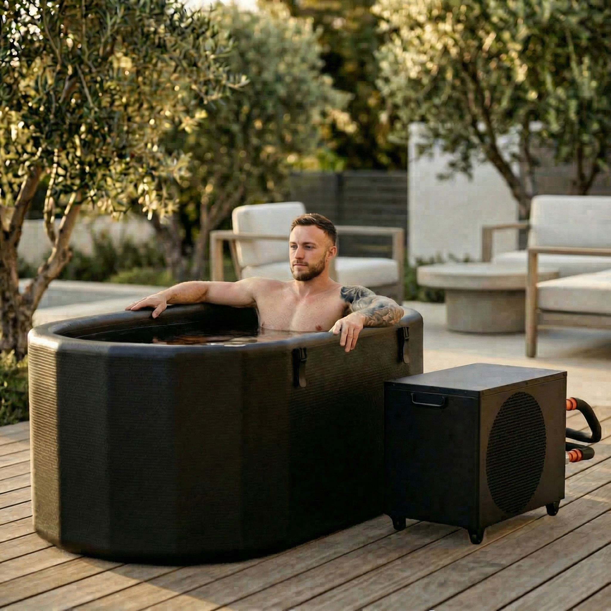 Man relaxing in an outdoor Nicebeam Cryo Pro tub 