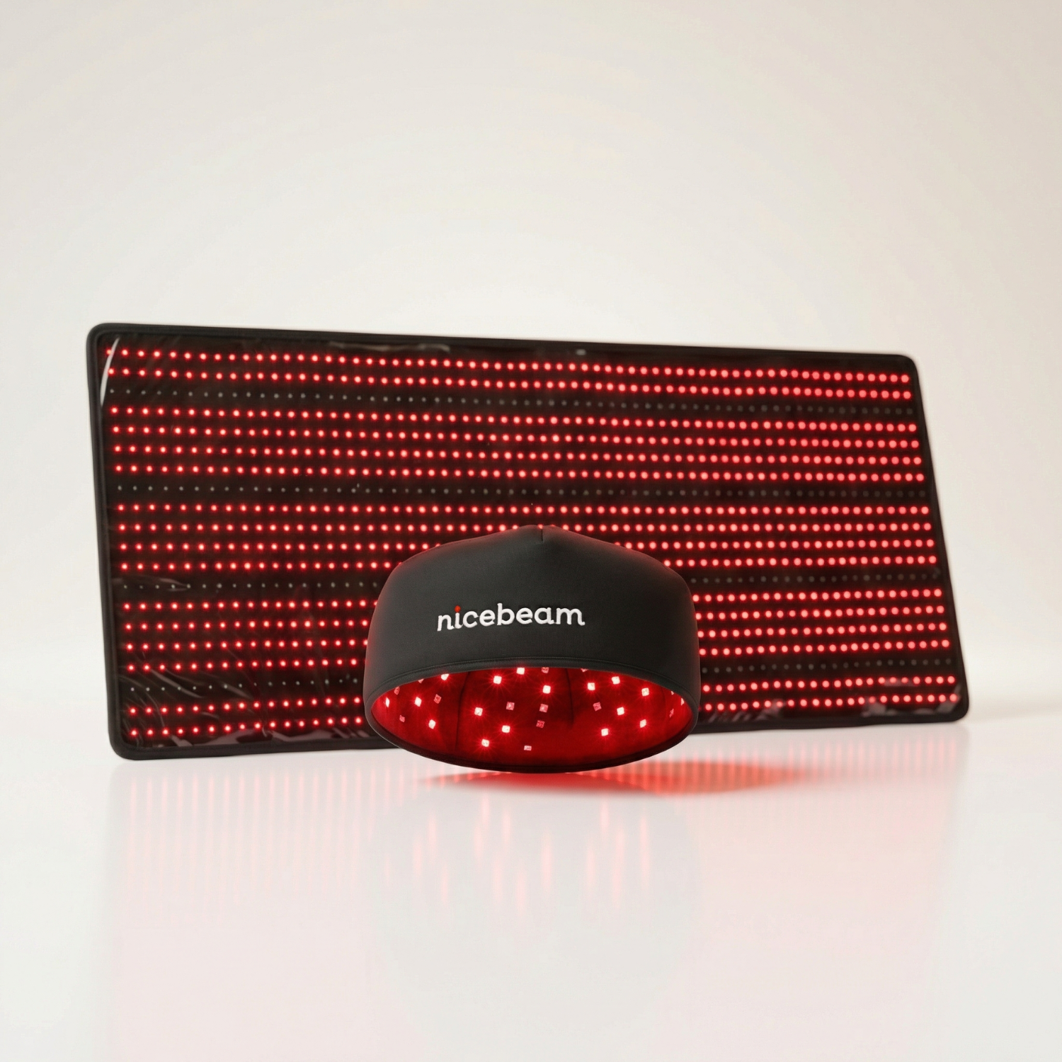 Nicebeam Red Light Therapy Bundle | Full Body Mat + Hat, Mask, Lamp or Bag showcasing a red light mat and therapy hat.