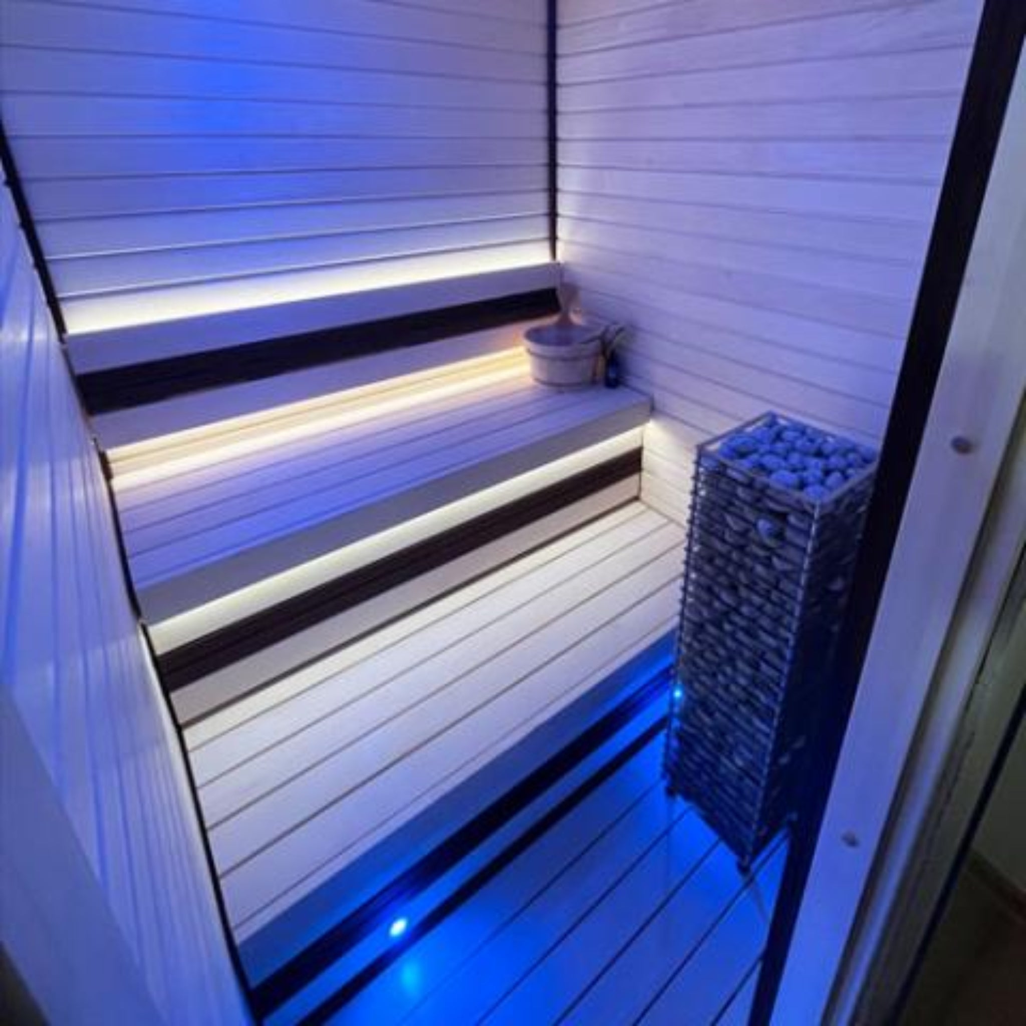 HUUM CLIFF 6kW sauna heater — full room lifestyle view