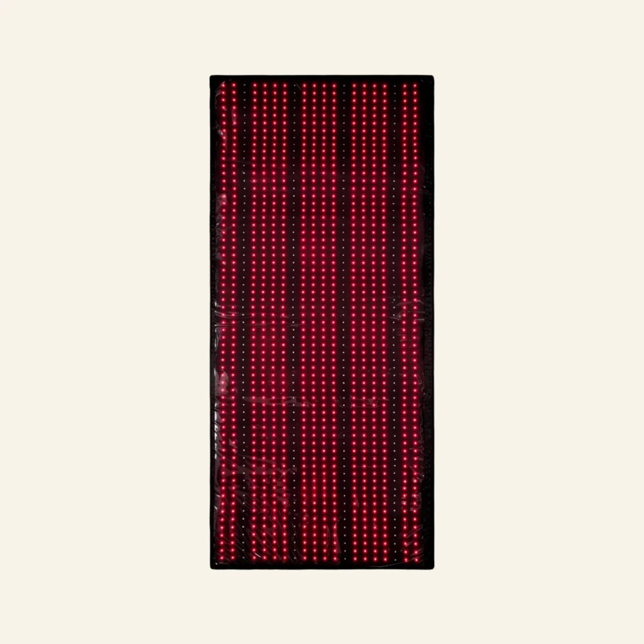 Nicebeam rectangular LED red light mat with multiple vertical rows of glowing red dots, centered on a light cream background.