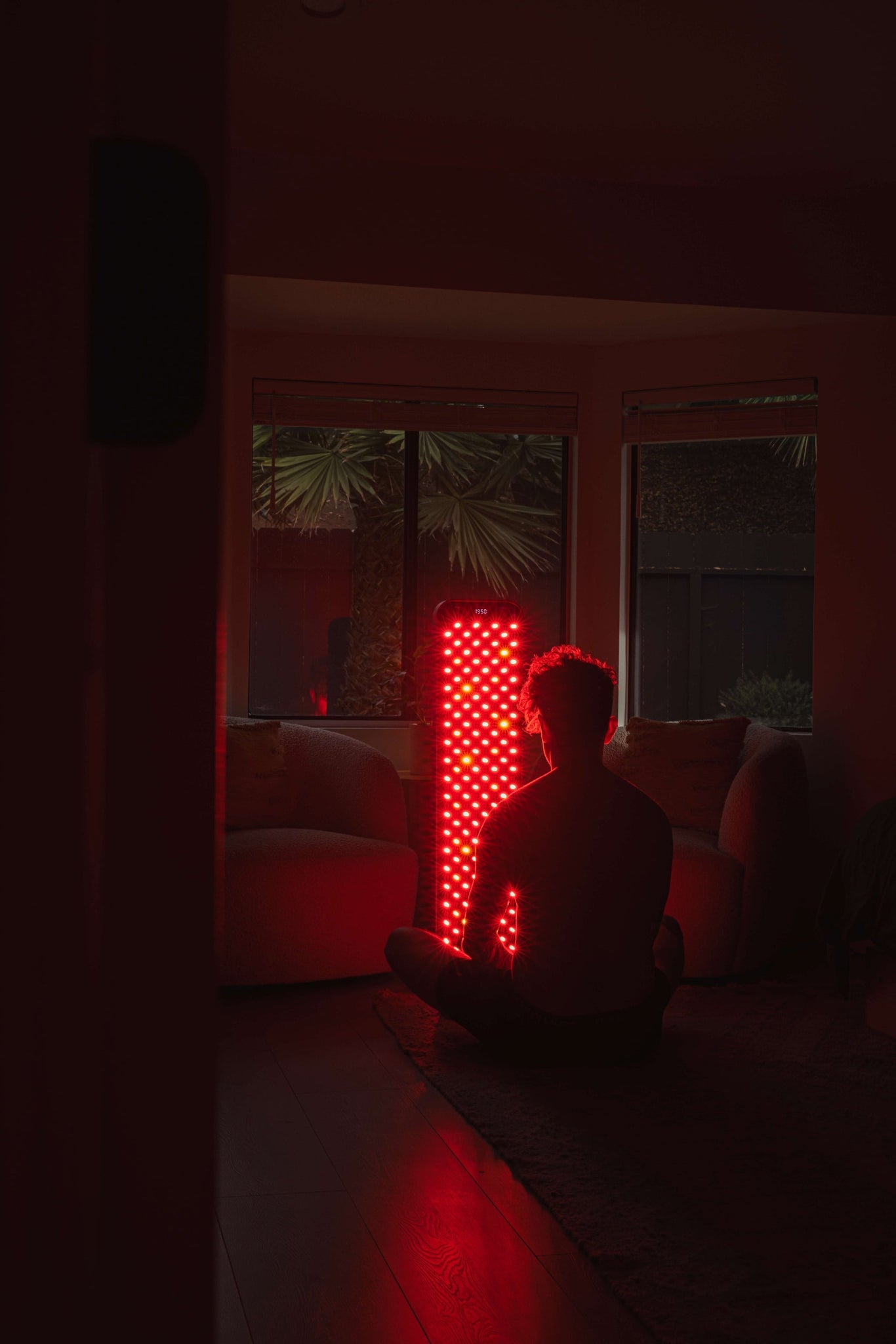 Person using Renew Red Light Large Panel 